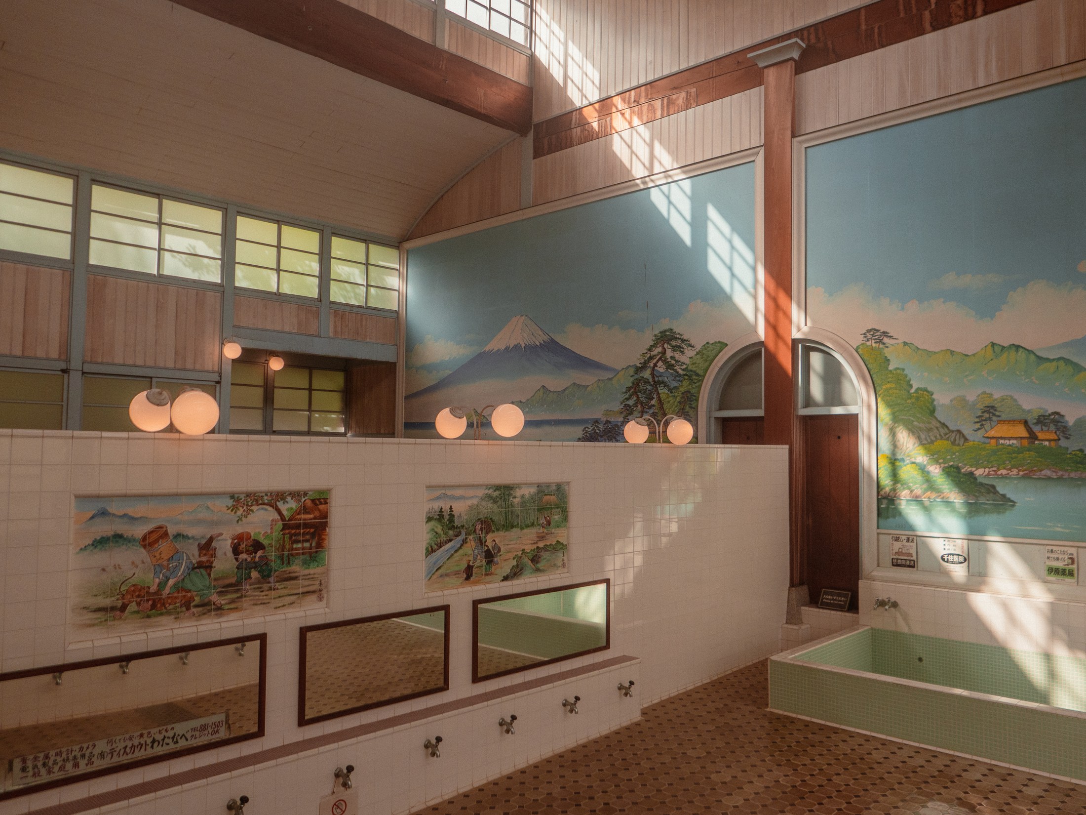 A Japanese bathhouse with a Mount Fuji mural